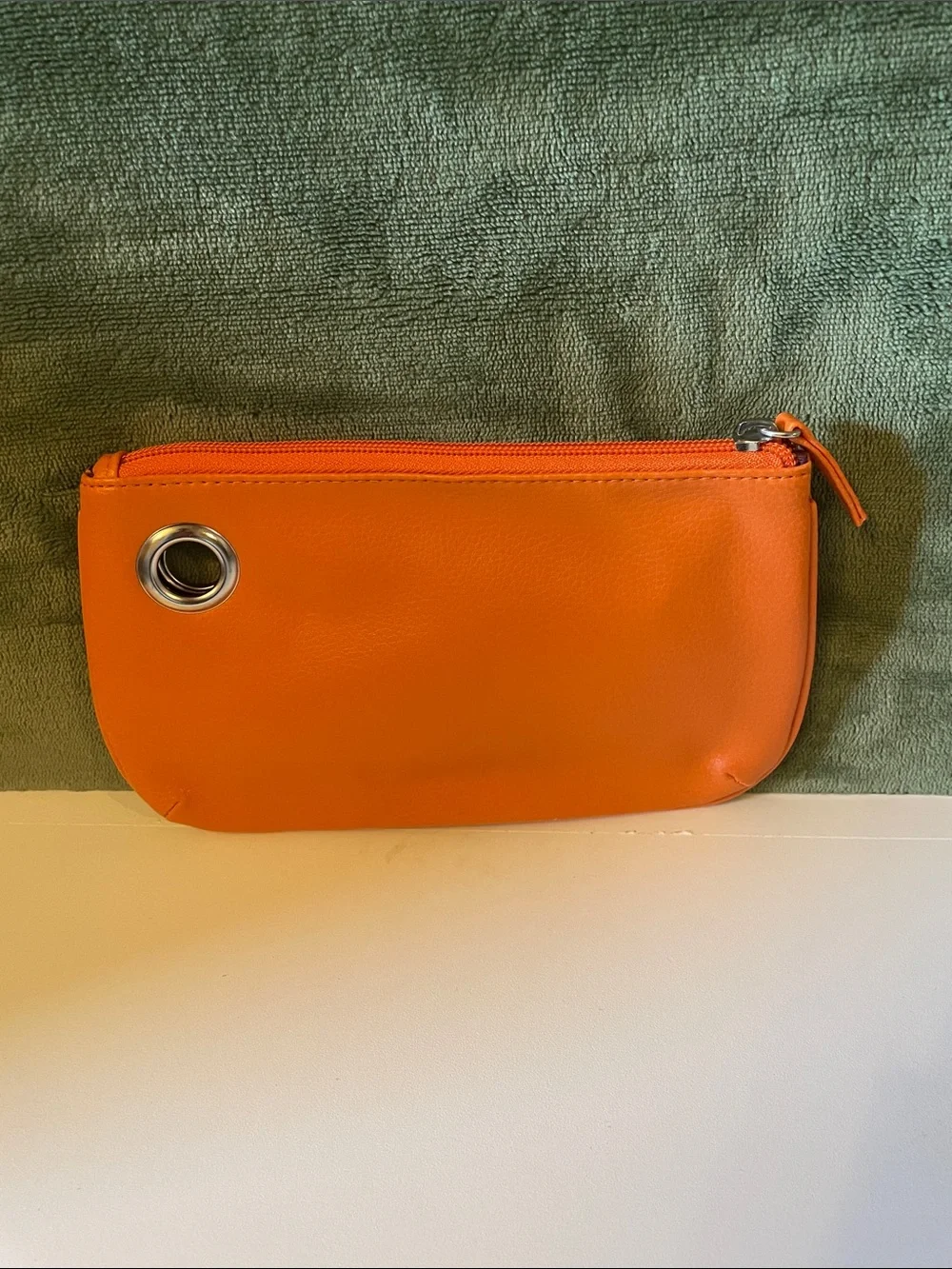3 Piece Set of Cosmetic Bags; 1-Orange(Non/leather), 2- Multicolored(Cloth)